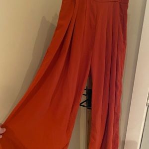 Burnt orange flowy pants, size XS